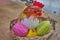 Easter chick decoration in a nest hatches colorful easter eggs