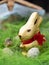 Easter chocolate rabbit hunts happy eggs. Gold bunny. Beautiful theme