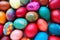 Easter colorful eggs close up. Many colorful holiday eggs are stacked close to each other. Boiled chicken eggs with