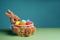 Easter colorful eggs in a straw bunny basket on green blue background. Happy Easter