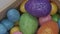 Easter colorful and shining quail eggs rotating and close up. Holiday healthy food concept.