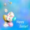 Easter composition of a blue shade with eggs with a wonderful pattern drawn like a garland