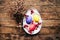 Easter Composition with chicken Eggs on the Warm Wooden Background. Easter composition with fresh eggs. Chicken egg in the nest. C