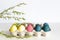 Easter composition with colored eggs in tray