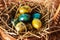 Easter composition. Cute painted easter eggs  are placed on nice haystack from dried straws and inside wicker basket. Greeting