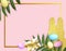 Easter composition with golden frame, colorful eggs,  glitter bunny cutout, green leaves on pink background.