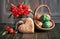 Easter composition with red tulips, wooden heart and a basket of