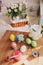 Easter craft with kids - painting eggs at home. Seasonal spring decorations