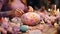 Easter crafting party where friends and family create vibrant pastel-colored Easter decorations and crafts. The lively atmosphere