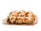 Easter cross buns and sultanas isolated on white background