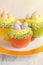 Easter cupcakes decorated with eggs in nest