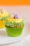 Easter cupcakes decorated with eggs in nest