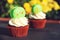 Easter cupcakes with macaroons. Delicious Easter cupcake on table. Easter french desserts