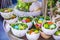 Easter decor, hanging baskets with color eggs in the grass, eggshell baskets, Easter decoration