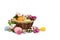 Easter decoration. Flowers apple tree, colored easter eggs and quail eggs in the basket on white background with space for text