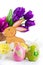 Easter decoration with rabbit, eggs and tulips