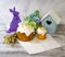 Easter decoration set with glazed kulich and vanilla eclairs