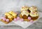 Easter decoration set with glazed kulich and vanilla eclairs