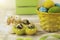 Easter decorations with Easter eggs, ceramic bunnies and ribbons
