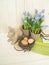 Easter decorative composition on a wooden background. Spring.