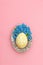Easter egg decoration forget me not flowers pink background