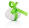 Easter egg with festive green bow on white background