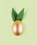 Easter egg painted in gold color with green bunny ears. Happy Easter minimalistic background