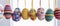Easter egg shaped cotton thread handcrafts hanging from top. Concept of happy easter day