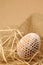 Easter egg with white crochet decoration