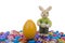 Easter eggs and bunny over white background