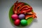 Easter eggs and chopped bell peppers in a plate