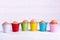 Easter eggs in colored buckets, place for text