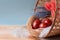 Easter eggs, colored an onions peel, in a basket on a wooden background