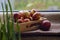 Easter eggs are coloured by the ancient onion husk method with various natural patterns lying by window in sunshine on beige