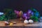 Easter eggs in composition with flowers in rustic style,