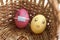 Easter eggs with Corona virus COVID19 protection concepts. DIY Do It Yourself easter egg wearing and not wearing mask for Easter