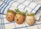 Easter eggs with cute face in green plant wreath. Sleepy easter eggs - Home crafts happy easter concept