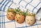 Easter eggs with cute face in green plant wreath. Sleepy easter eggs - Home crafts happy easter concept