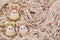 Easter eggs decorate as bunny dressing put on messy cutting paper nest background.