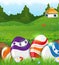 Easter eggs in the grass and rural house