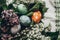 Easter eggs with lilac flowers on rustic background and wi