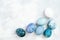 Easter eggs with marble stone effect painted with natural dye carcade flower on grey concrete background