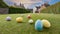 Easter eggs populate an typical English garden ready for egg hunt