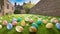 Easter eggs populate an typical English garden ready for egg hunt