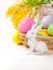 Easter eggs with rabbit and branch mimosa