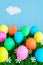 Easter Eggs in Rows - Blue Sky Vertical