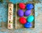 Easter eggs on rural blue moss background. wooden letters