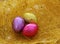 Easter eggs, three colorful shiny chocolate eggs