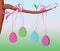 Easter eggs tied with pink ribbon