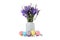 Easter eggs, vase with Iris flowers and pussy willow branches isolated on background